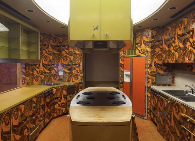 Image of a test kitchen with an orange and yellow psychedelic interior