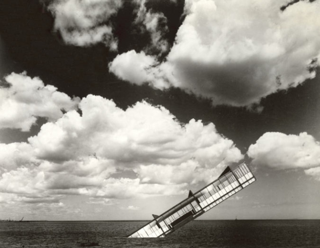 Image of Stanley Tigerman's Titanic, a sinking building in a field and clouds