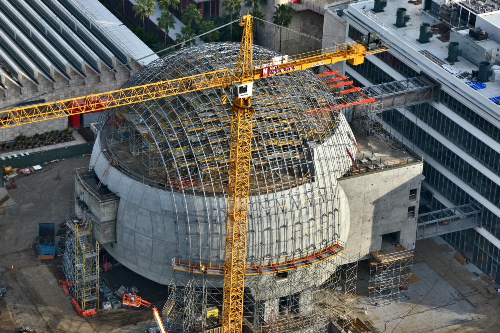 Aerial image of the under construction Academy Museum of Motion Pictures, featuring a giant glass dome
