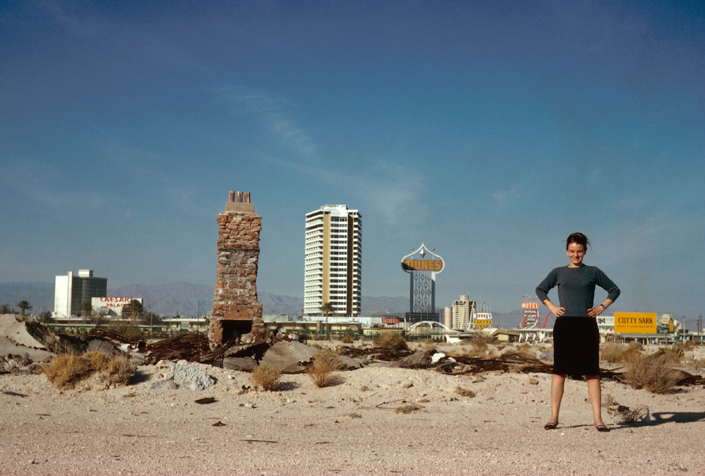 A young Denise Scott Brown in front of the old Vegas strip