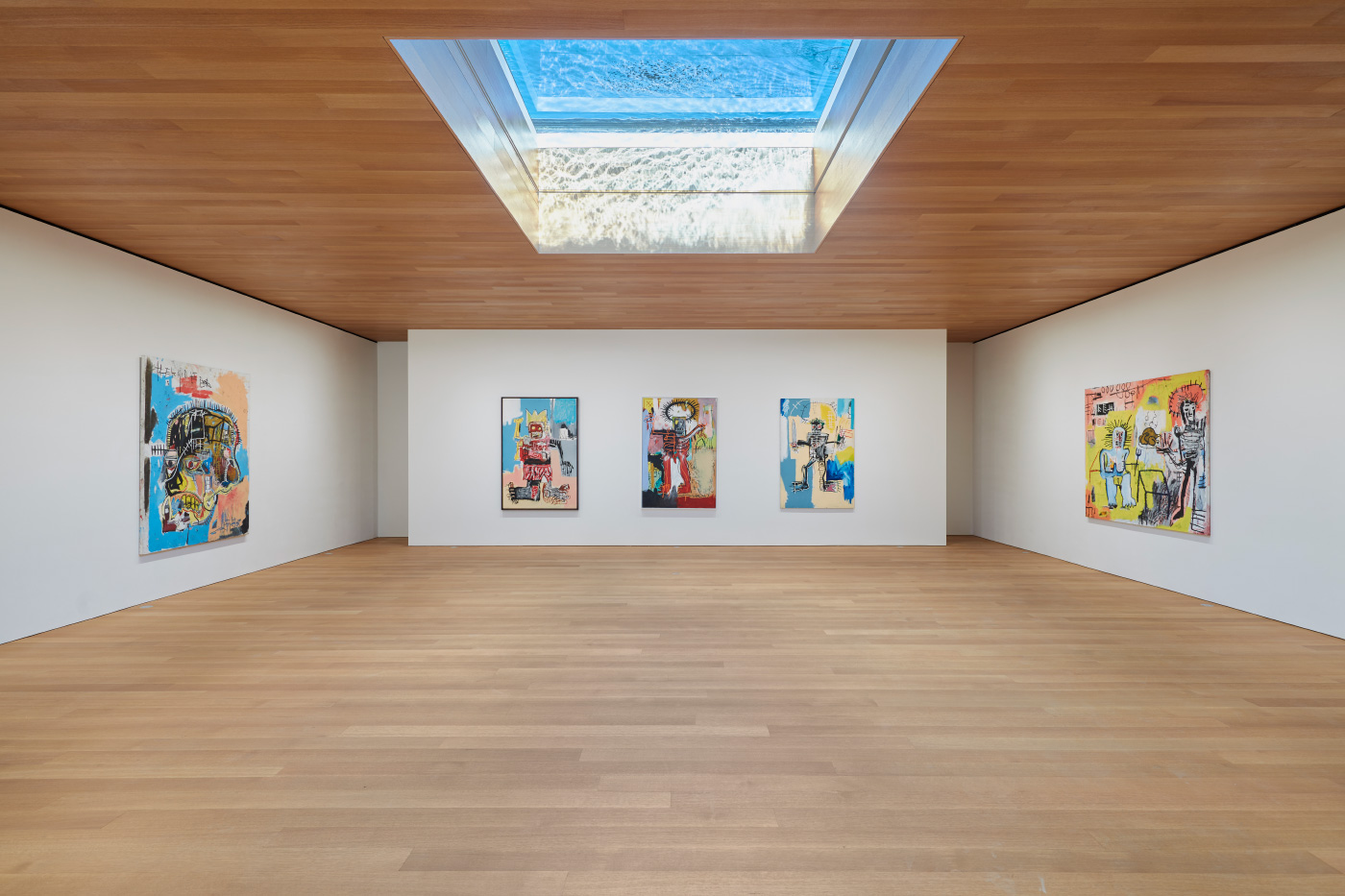 Interior photo of the Brant Foundation galleries, with an aquarium skylight distorting the light