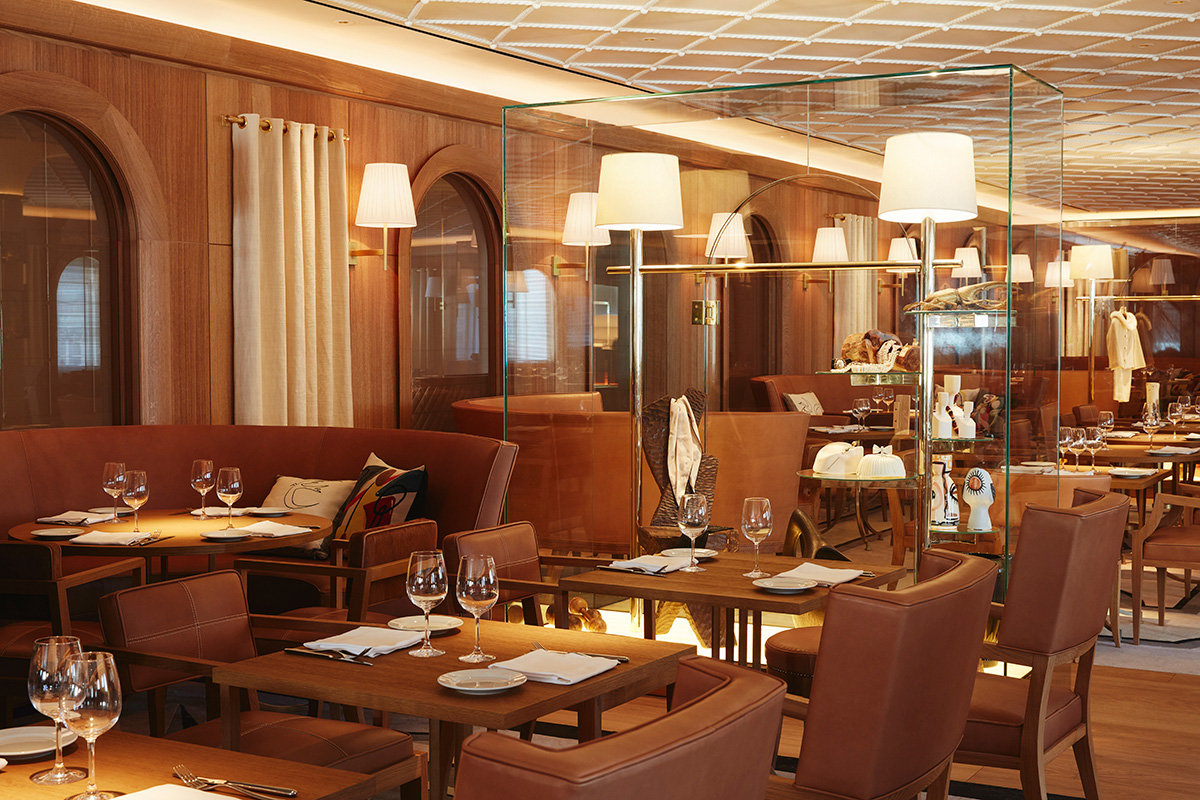 Image of interior of a beige-colored restaurant with wood, L'Avenue