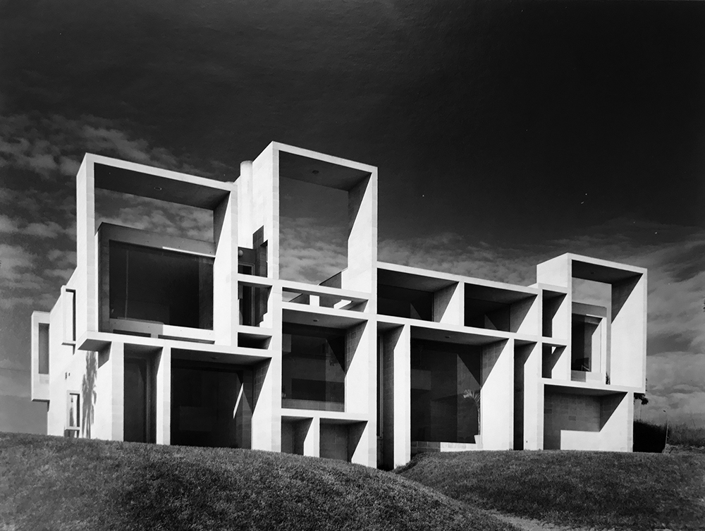 Black and white photo of a boxy Brutalist concrete home, the Paul Rudolph-designed Milam Residence