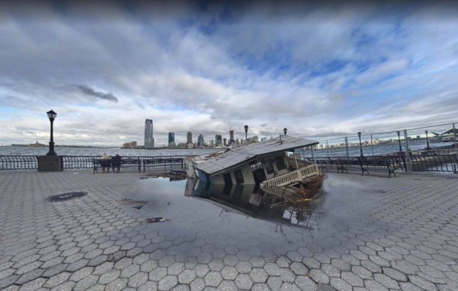 A damaged house sinks into the promenade at Battery Park City.