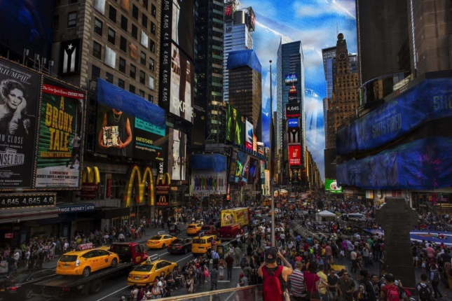 Photomontage of Times Square with FEMA tarps on signage