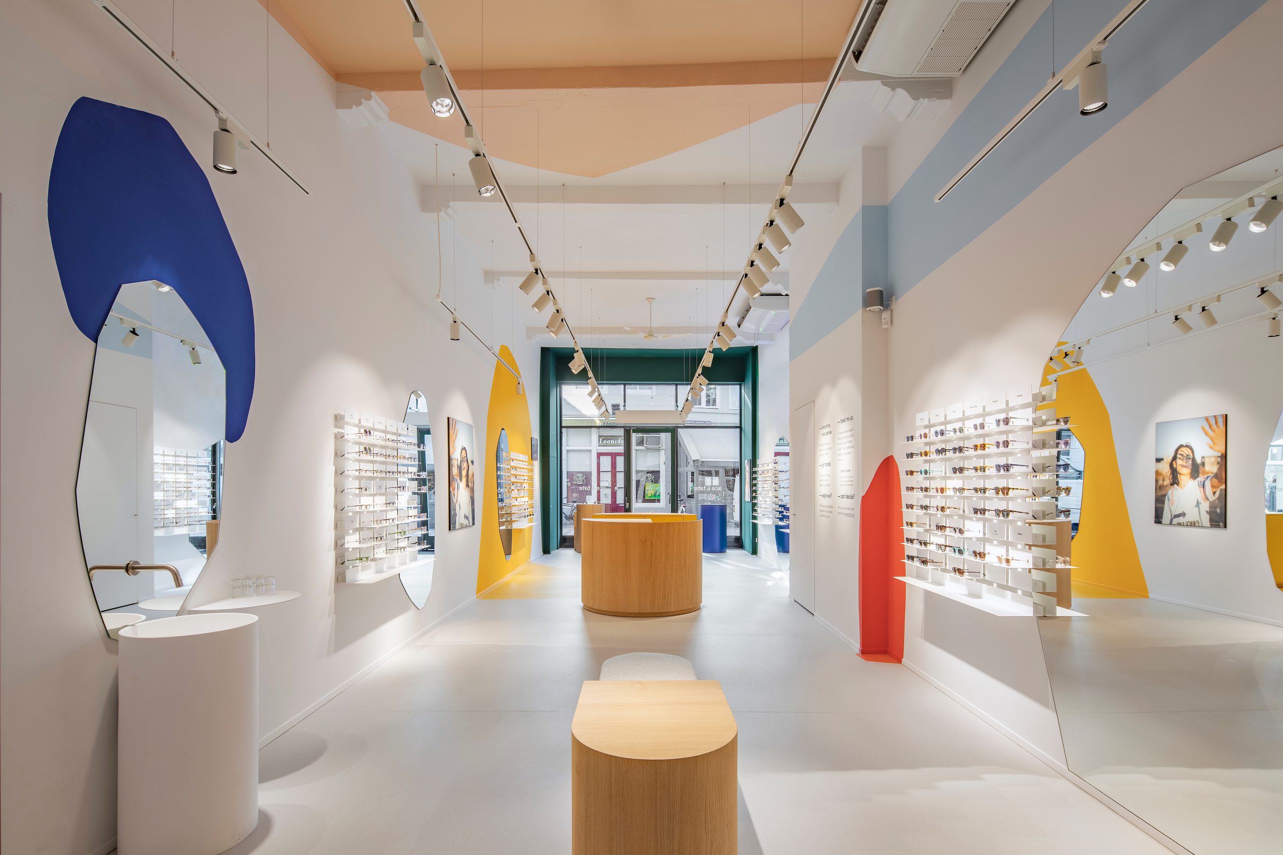 Interior of an eyeglasses store, decorated in reference to the paintings of Hieronymus Bosch