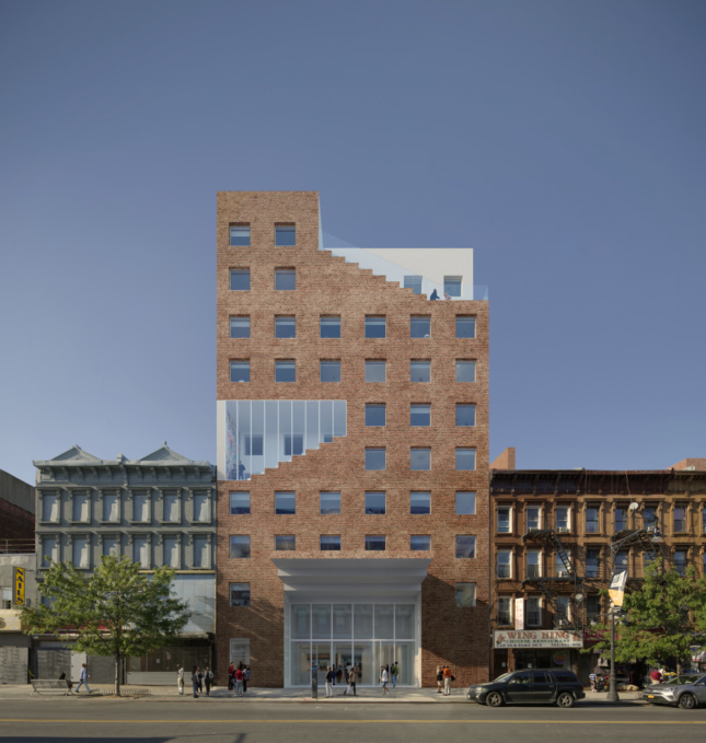 Rendering of a red brick tower, the new Brooklyn home of The Collective