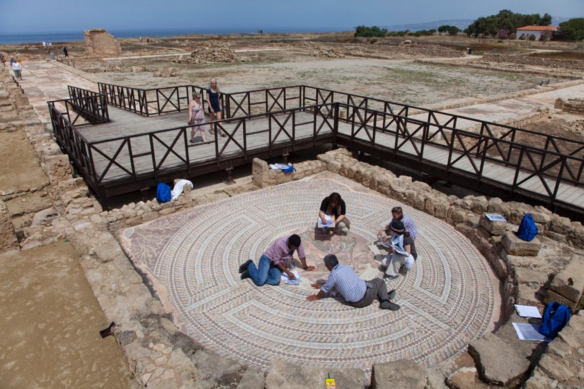 Participants in the 2014 MOSAIKON course Conservation and Management of Archaeological Sites with Mosaics conduct a condition survey exercise of the Theseus Mosaic at the archaeological site of Nea Paphos, Paphos, Cyprus. Part of the Getty conservation effort.