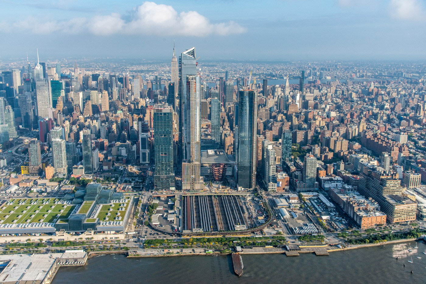 Aerial view of Hudson Yards towers next to river