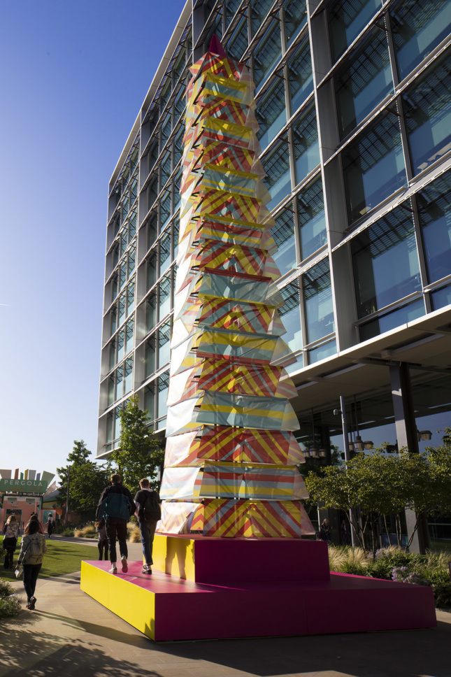 A billowing fabric tower in multiple colors as part of the London Design Festival