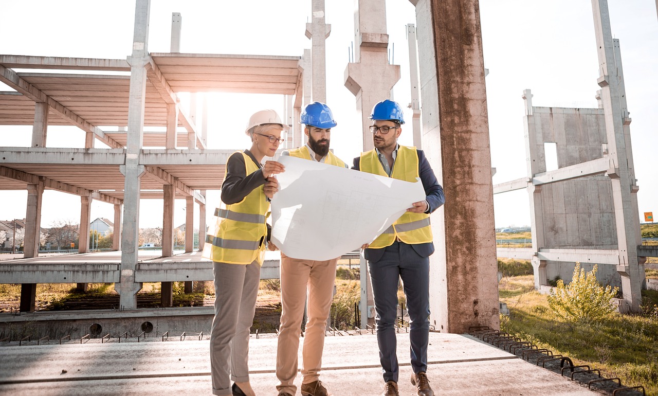 Image of architects standing on construction site, illustrating the Architecture Billings Index somehow