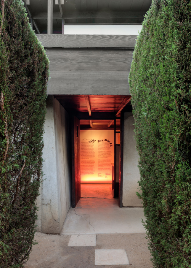 Entrance into a concrete gallery space