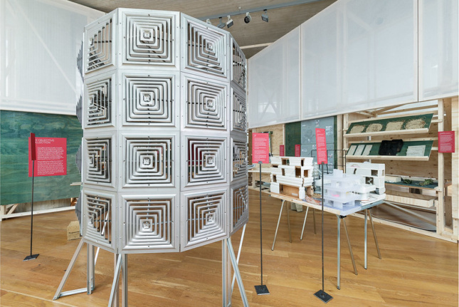 Installation view of a metal sheet screen at the Oslo Architecture Triennale