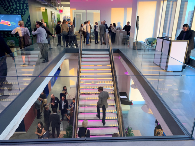 People ascending a staircase in the Arup office