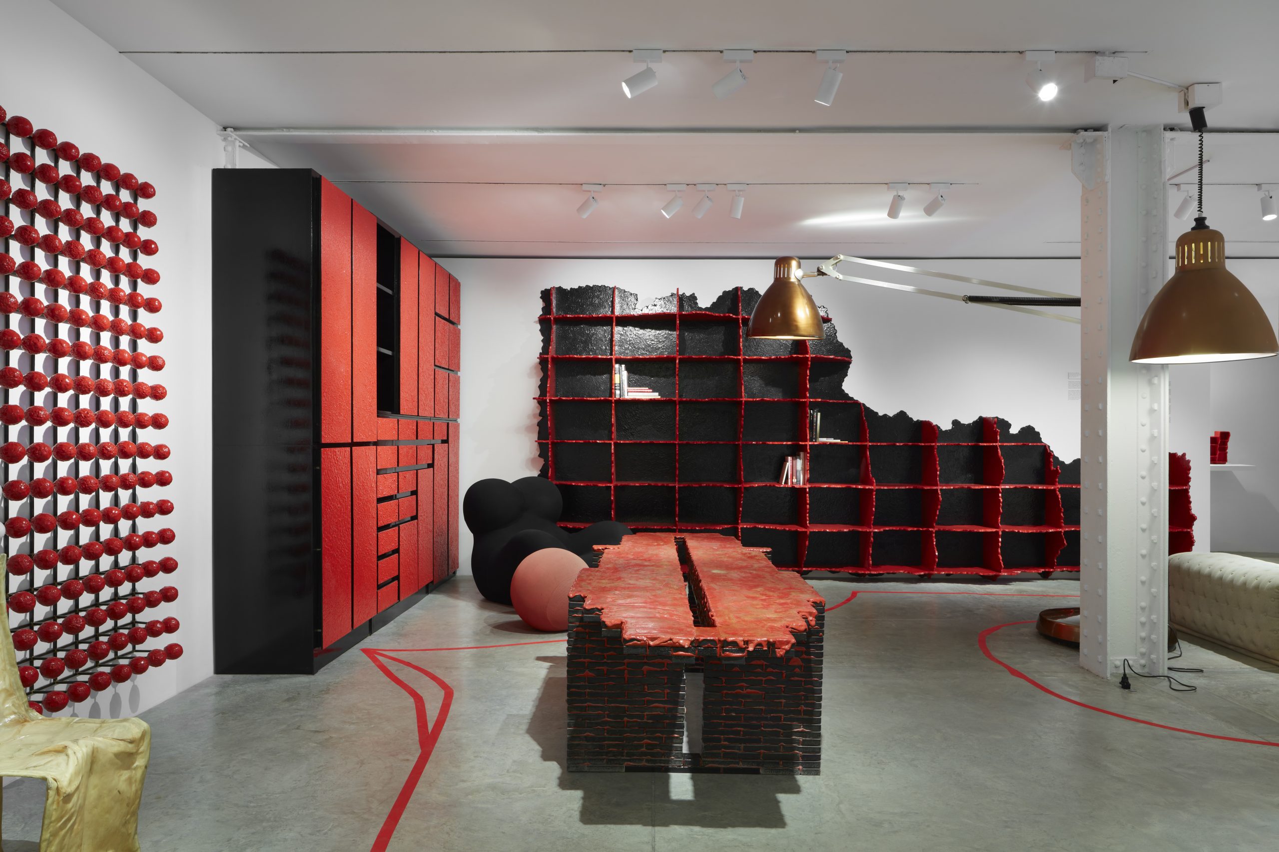 Display of melting red furniture designed by Gaetano Pesce