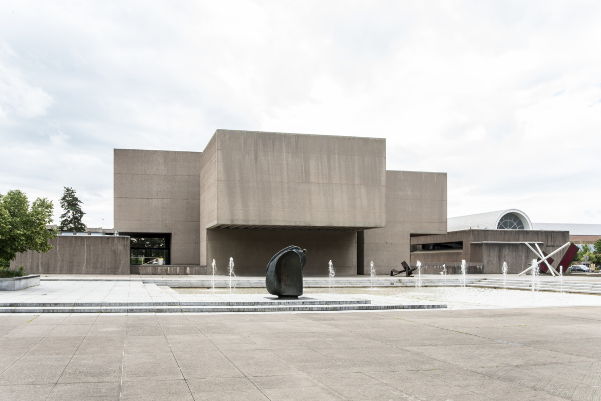 Exterior shot of concrete brutalist art museum and plaza