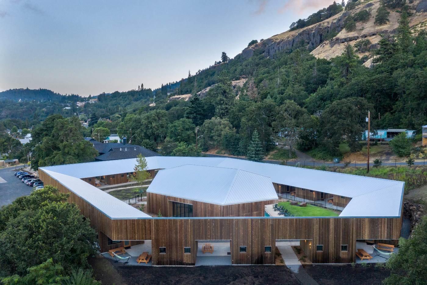 A pentagonal cabin and sauna set along a mountain, the new Society Hotel Bingen