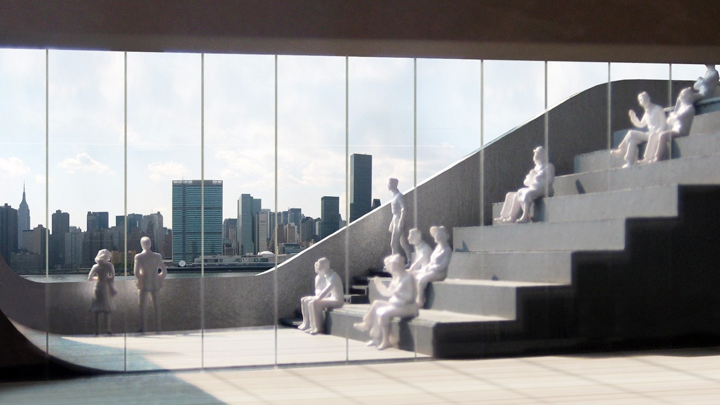 An architectural model by Steven Holl Architect's shows the staircase design for their new library. The Manhattan skyline is shown in the background.