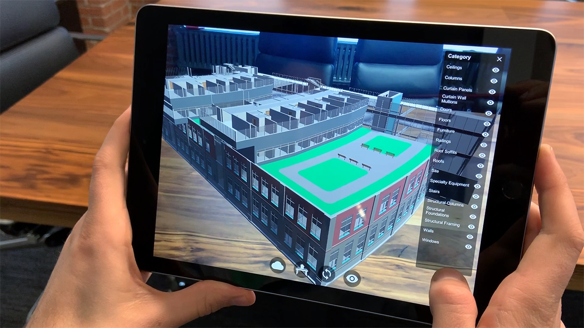 Image of iPad with architectural visualization on it