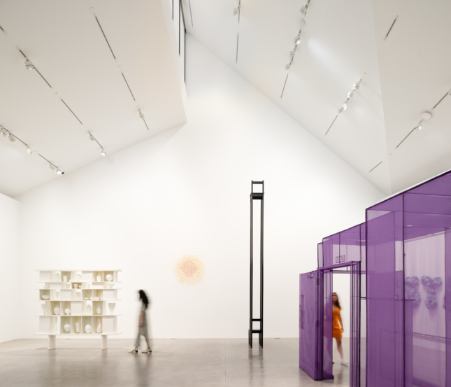 Installation photo of a triple-height gallery space