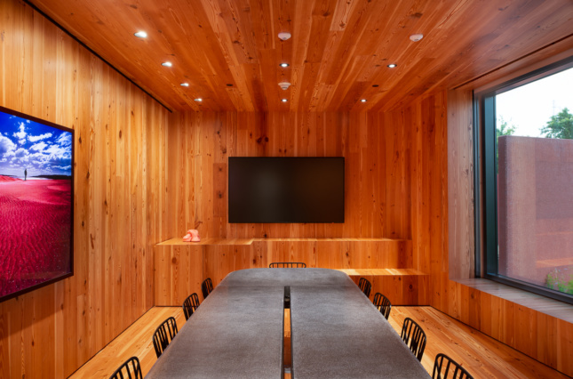 An all-wood paneled conference room