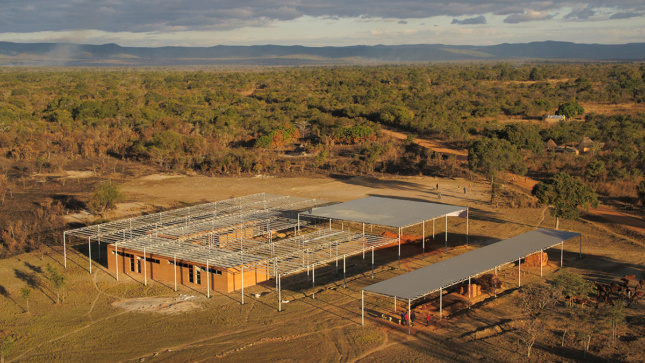 Aerial image of school in middle of African savanna in the village of Mwabwindo