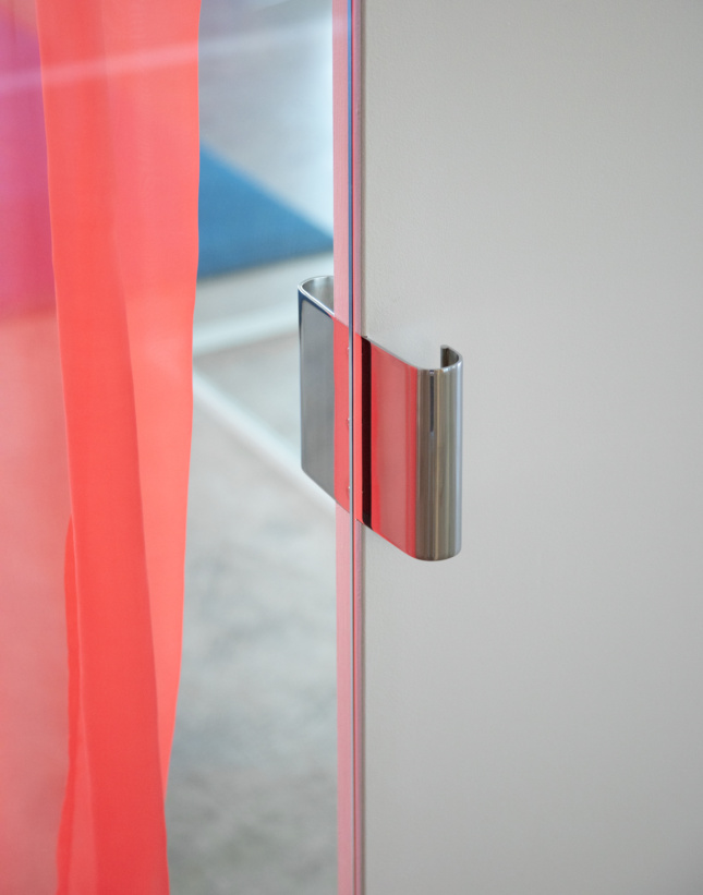 Metal door handle and colored curtain