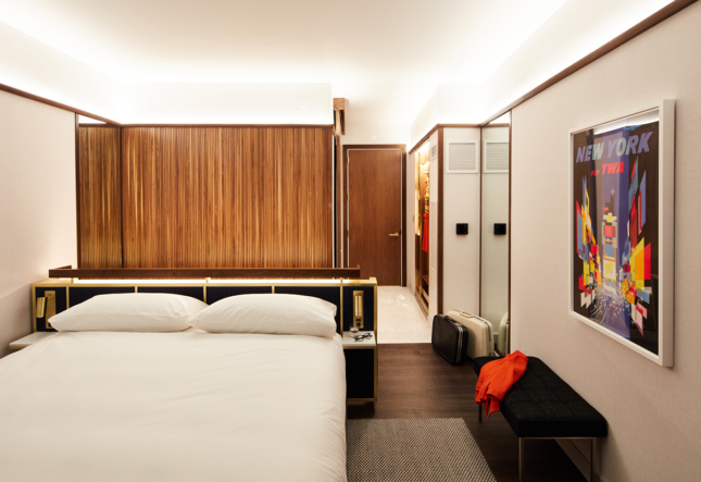 The interior lighting of a TWA Hotel guest room