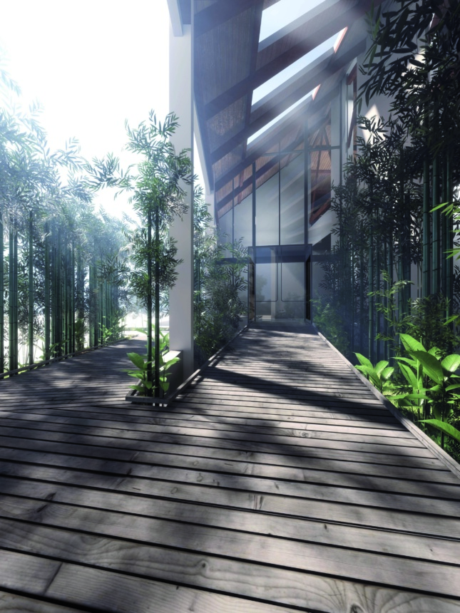 A rendering shows an entrance into a building with a wood ramp surrounded by greenery. Through a glass wall you can see inside the building with skylights letting the sun shine through into the space. 