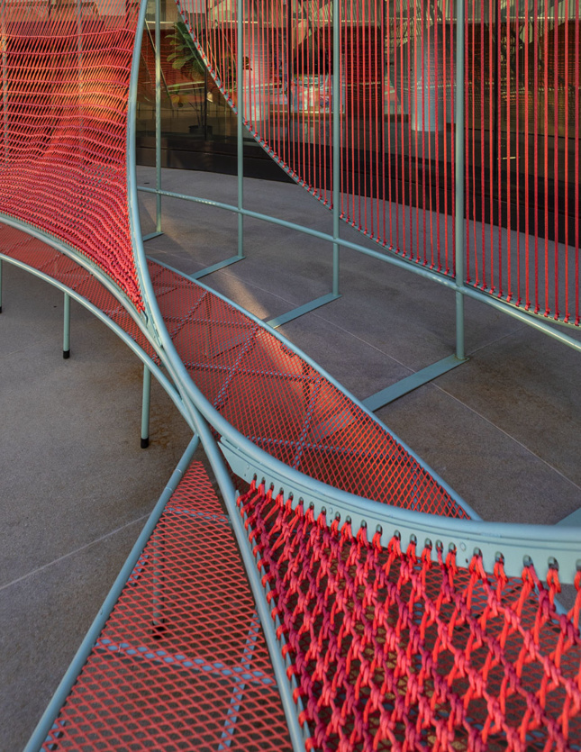 form made of red woven rope with blue structural support