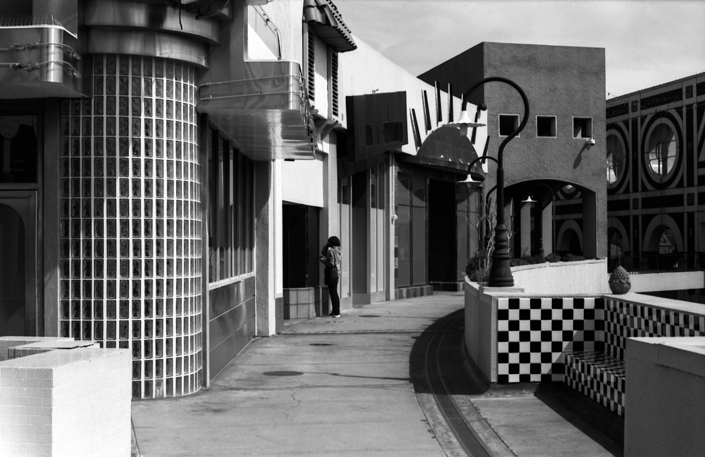 Black and white photo of Horton Plaza, a blocky shopping maill