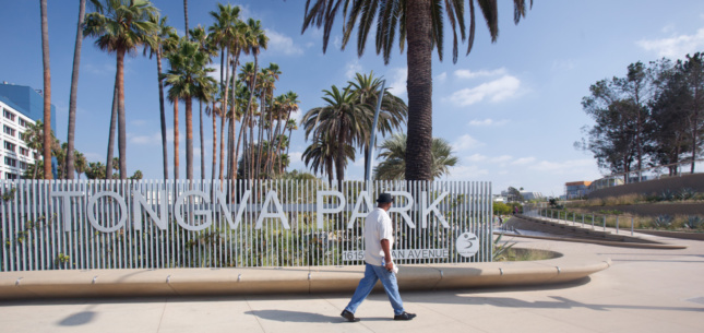 A slat gate with the words "Tongva Park" on it
