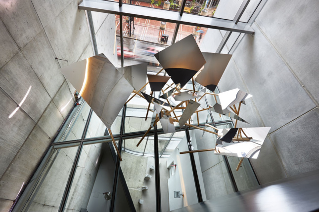 Mixed-media sculpture with metallic panels