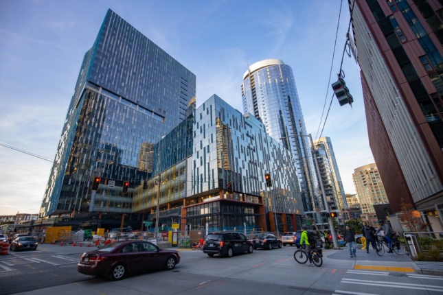 Exteriors street view of glass tower under construction in Seattle as part of the new Amazon campus