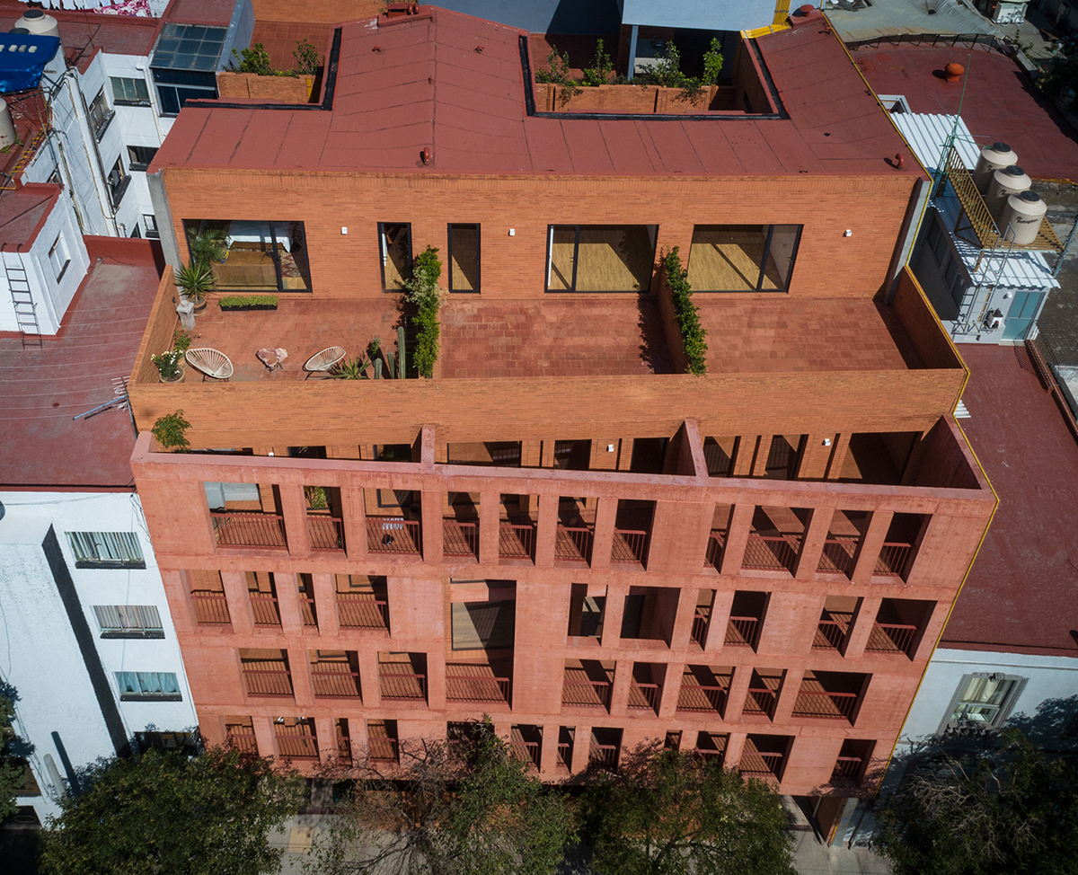 Exterior image of red brick building from above
