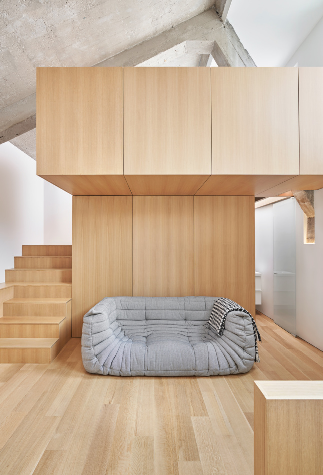 wood loft interior with couch