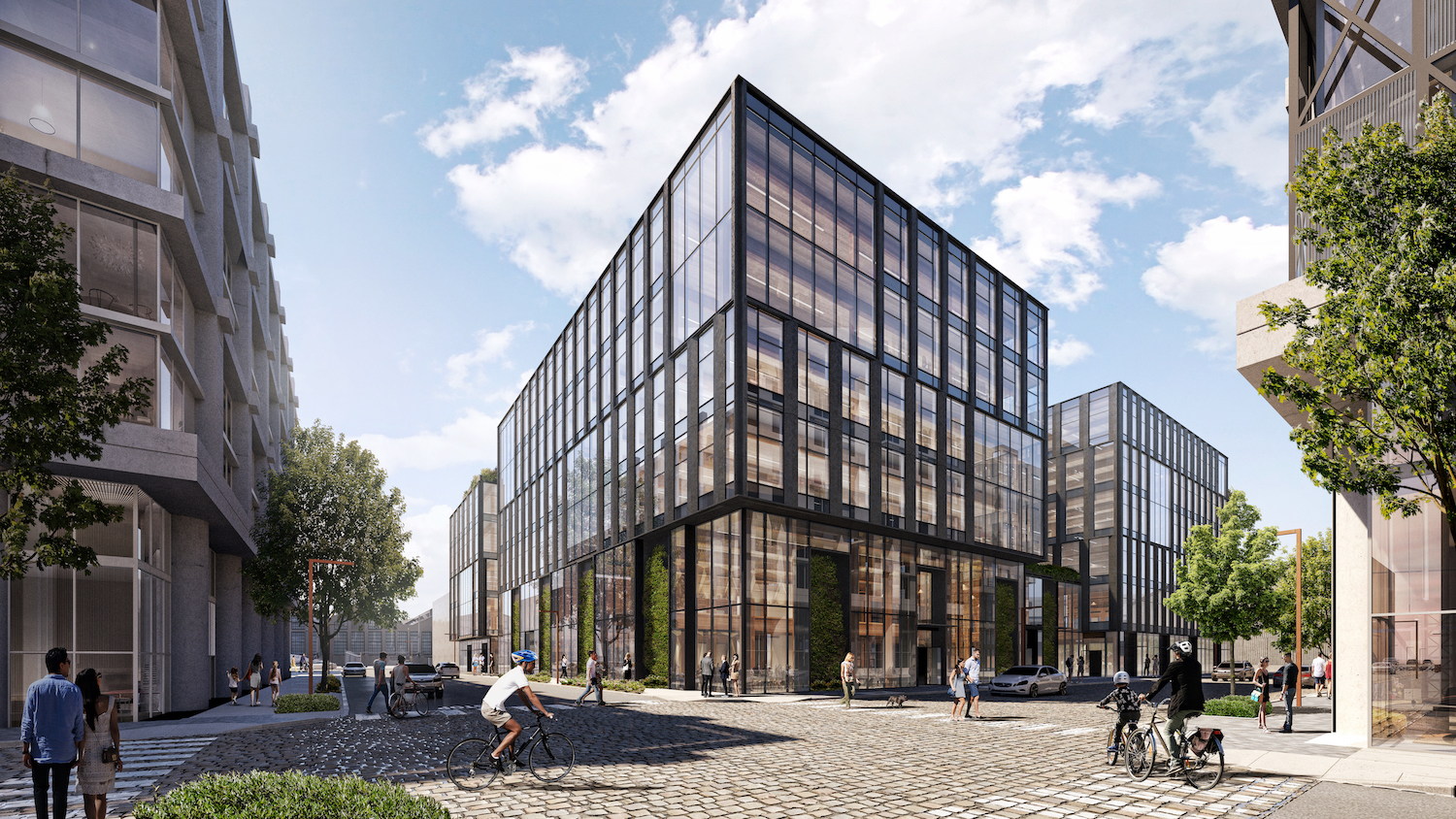 Rendering of square, glass-clad building with dark steel framing sitting on the new Pier 70