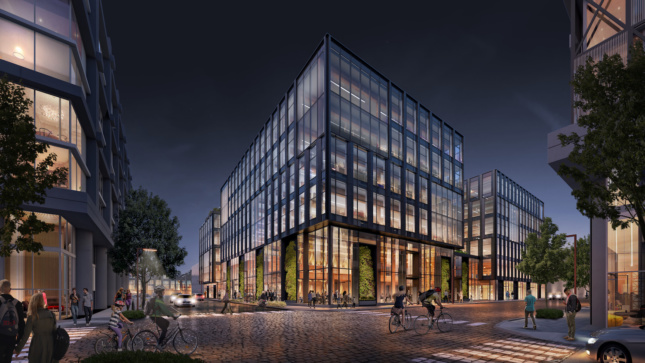 Exterior night rendering of lit-up office building