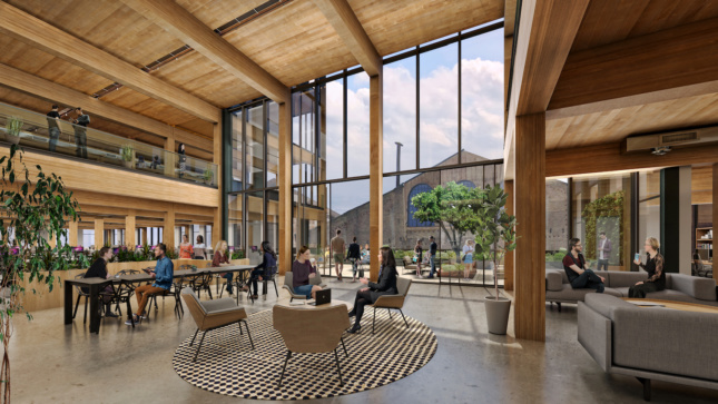 Rendering of interior office lounge with all-wood construction and double height windows looking out to Pier 70