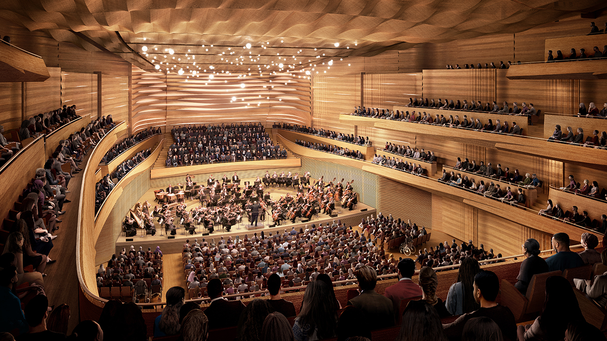 A render of a wood concert hall with curved forms and many people seated and the New York Philharmonic performing