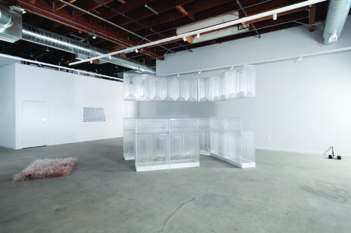 Interior view of gallery space with translucent sculpture in center