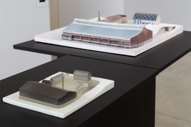 Architectural models of different warehouses