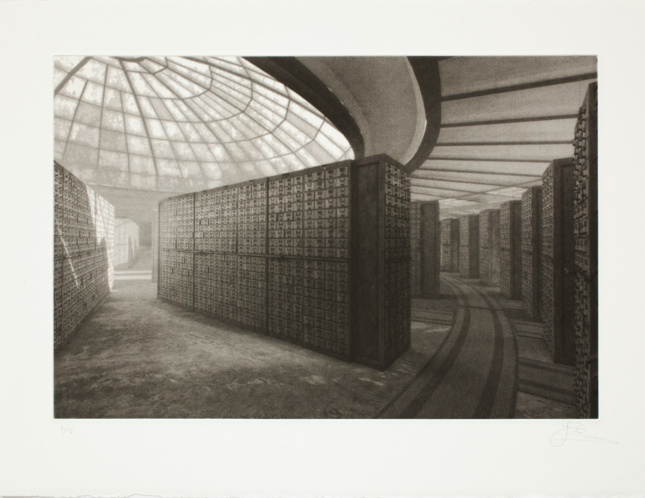 A sepia photo of filing cabinets around a central column