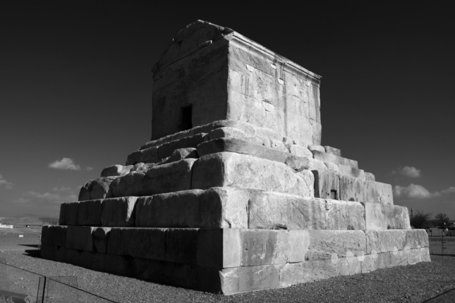 A stone tomb on a plinth