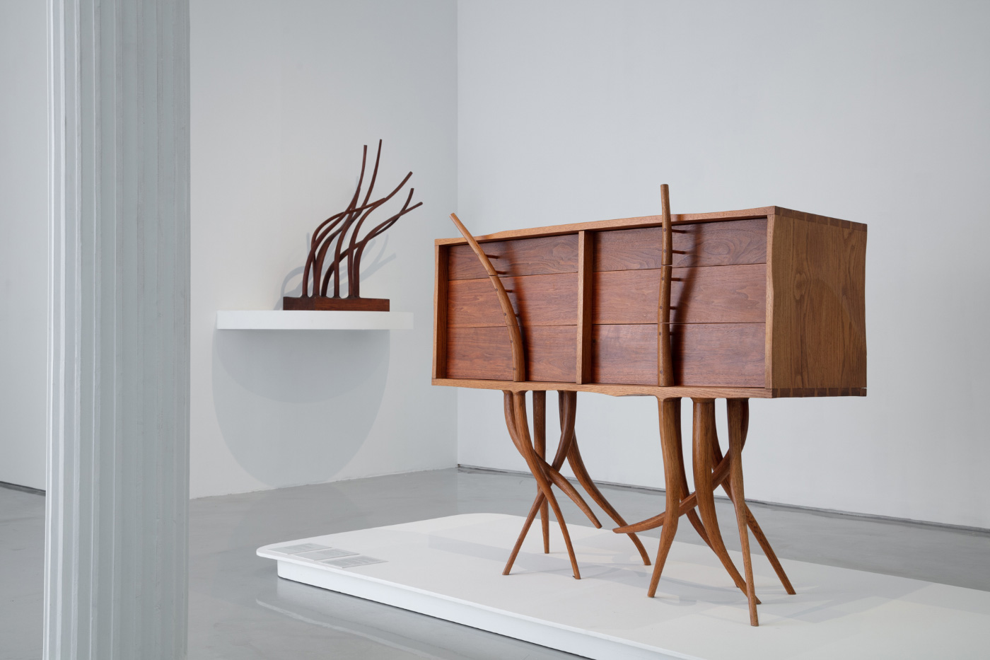 A Wendell Castle-designed dresser with branches for legs
