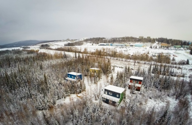 Aerial photo of snow-covered arctic housing