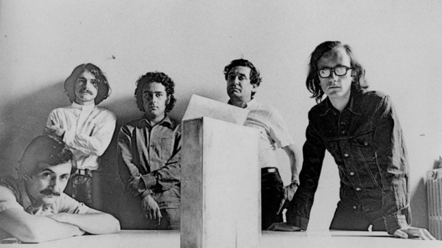 Black and white photo of five men, including Adolfo Natalini