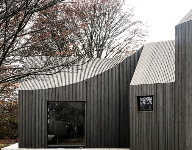 A sloping wood home designed by an Emerging Voices winnter