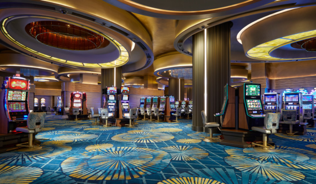 Interior photo of a casino floor with eccentric carpeting