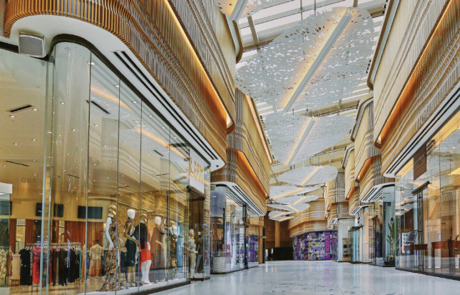 Interior photo of a mall-like setting with high ceilings